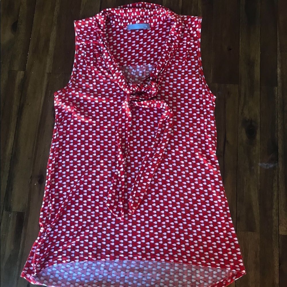 Olivia Moon sleeveless blouse with tie neck.